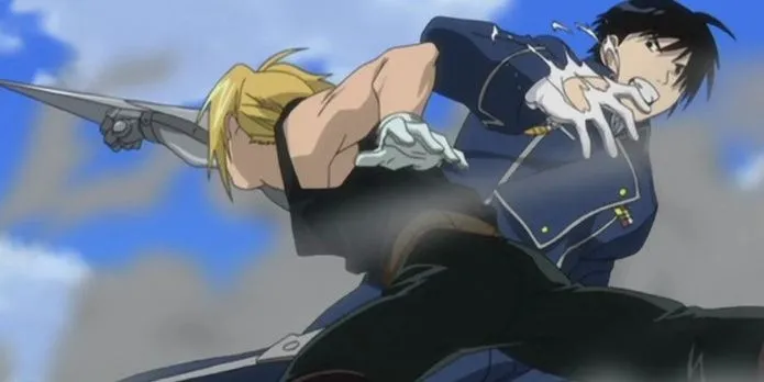 Edward Elric và Roy Mustang, hai Giả Kim Thuật Sư Quốc gia có mối quan hệ thầy trò và đối đầu trong Fullmetal Alchemist Brotherhood