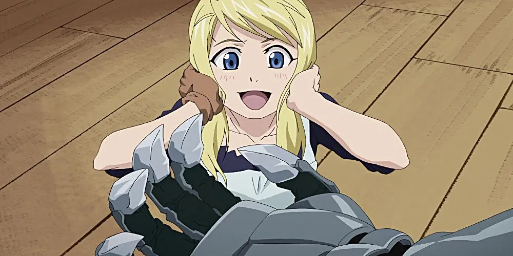 Winry Rockbell từ Fullmetal Alchemist Brotherhood, thợ cơ khí tài giỏi và là biểu tượng của tình yêu kiên nhẫn