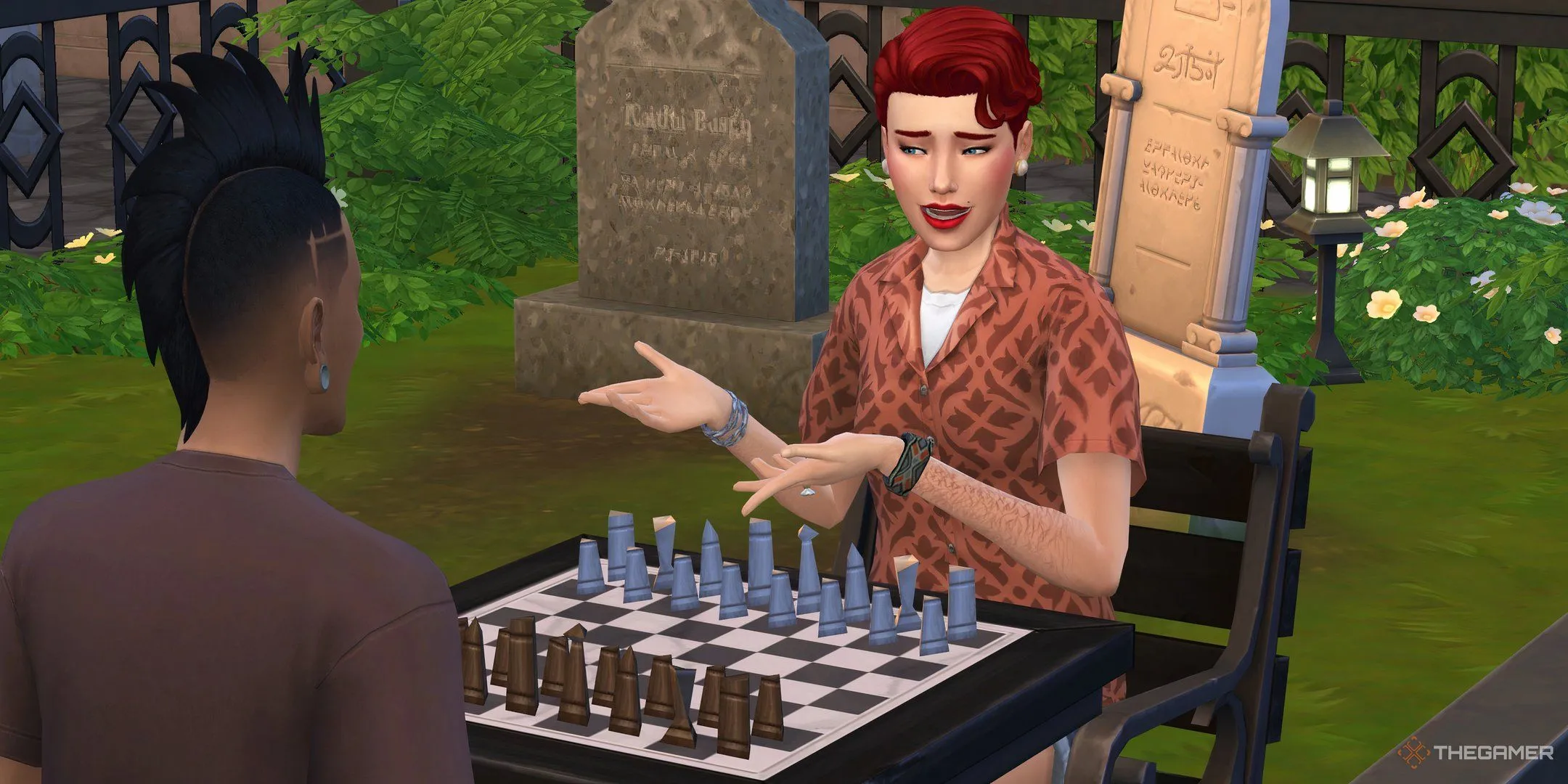 Hai nhân vật Sims chơi cờ vua gần bia mộ trong The Sims 4