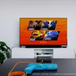 Hệ thống súng light gun G'aim'e Plug & Play đang hoạt động trước màn hình TV.