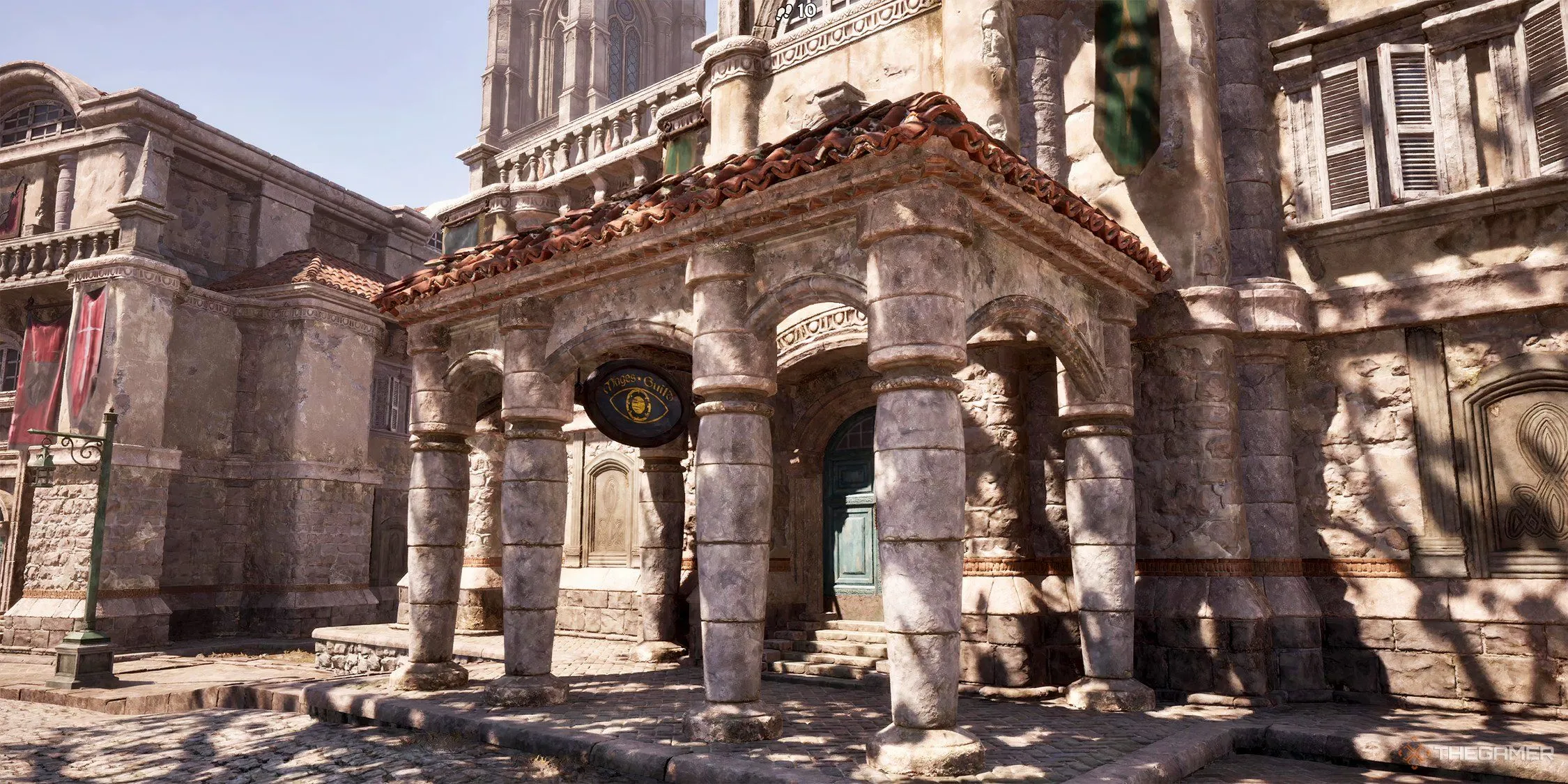 Người chơi đứng trước hội quán Mage Guild ở Anvil, thành phố ven biển với kiến trúc san hô độc đáo trong Oblivion.